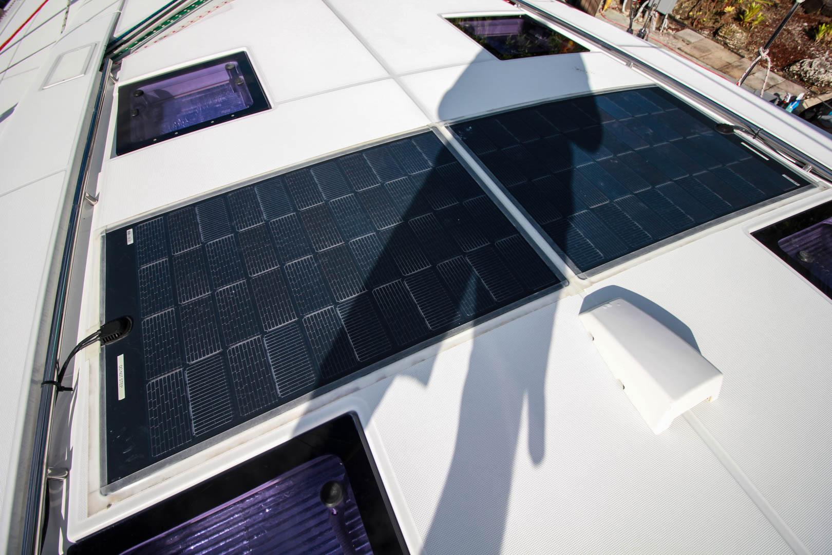 Slide: The Image of Solar panels on the deck of a 2015 Beneteau Sense 55 sailboat. - 20