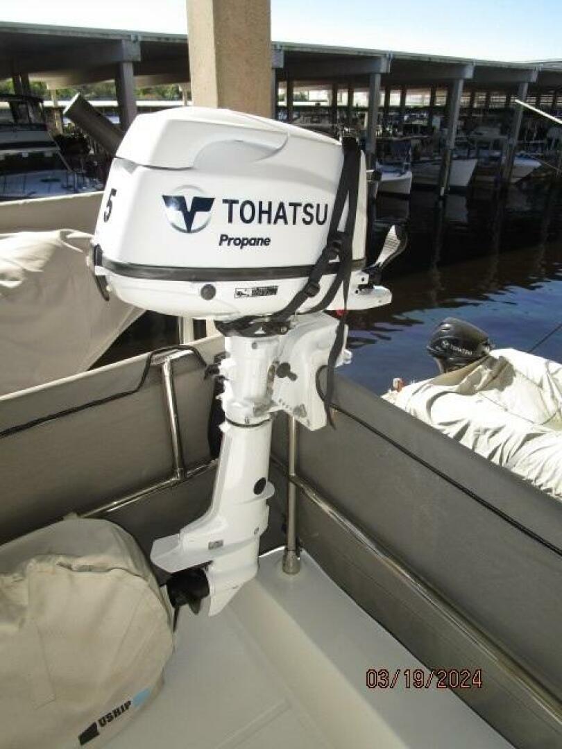 Slide: The Image of 50' Beneteau tender outboard - 4242575