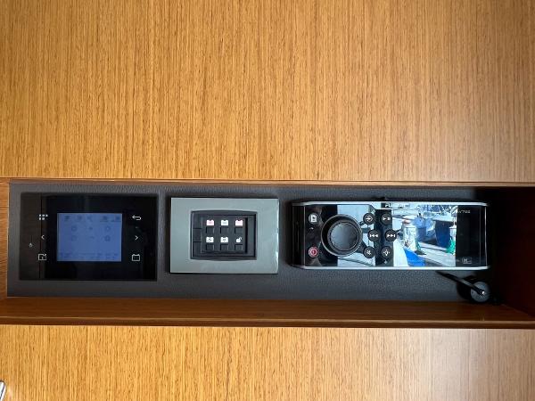 Slide: The Image of Control panel of 2021 Beneteau Swift Trawler 41 with navigation and monitoring systems. - 20