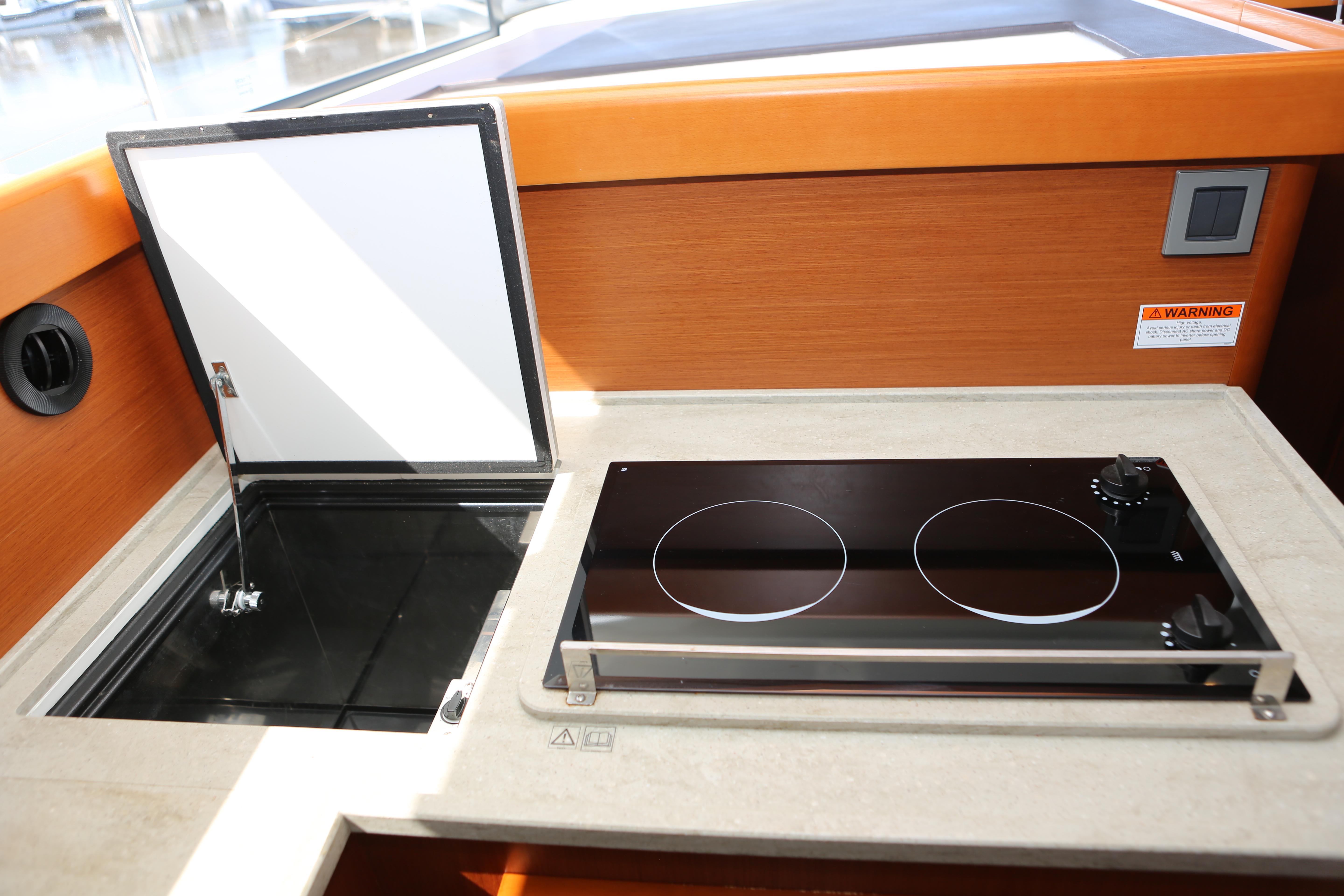Slide: The Image of Electric  stove and top loading freezer - 5