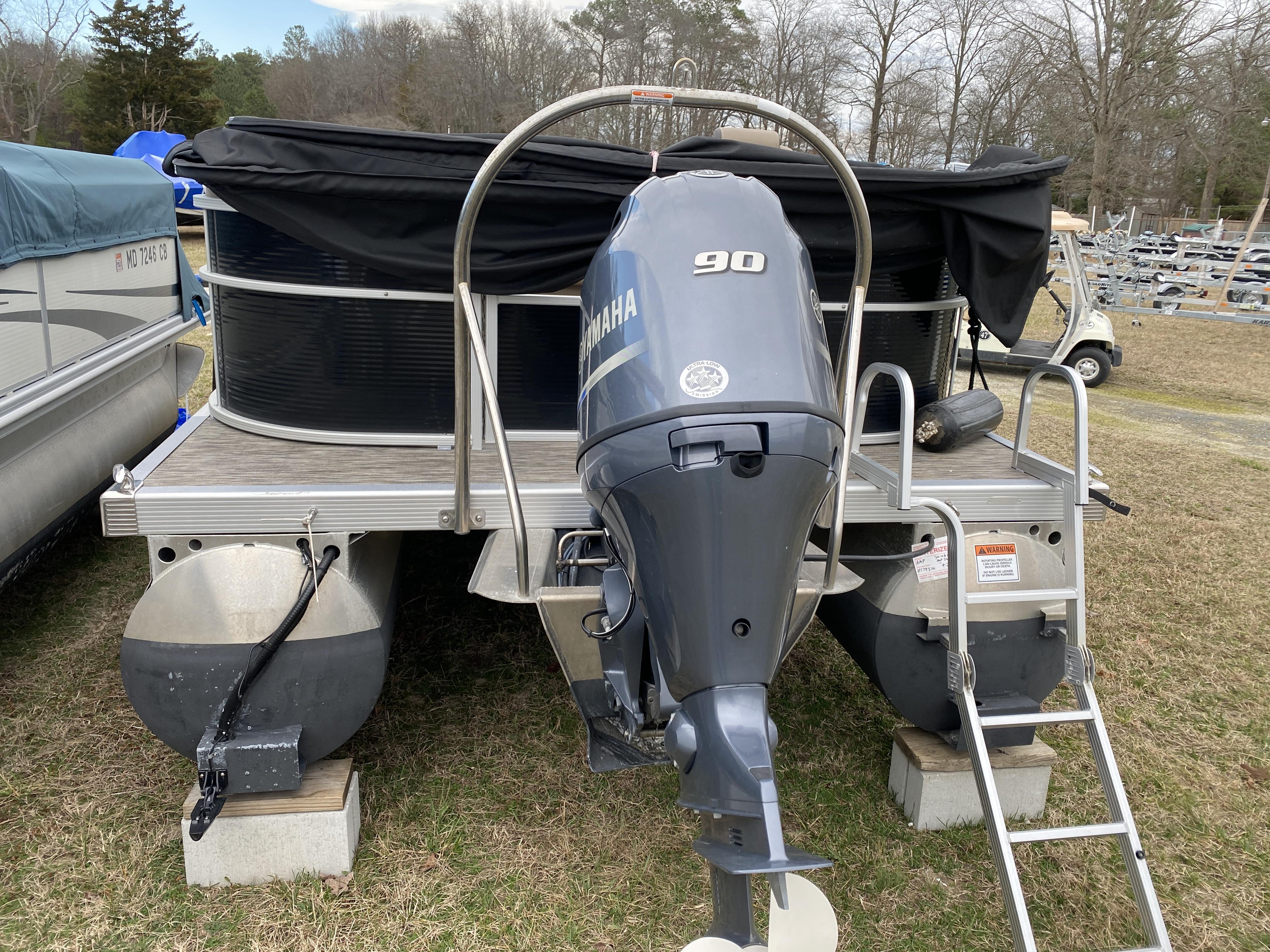 Slide: The Image of 2021 Bennington 20 SSR pontoon boat with Yamaha 90 outboard motor. - 2