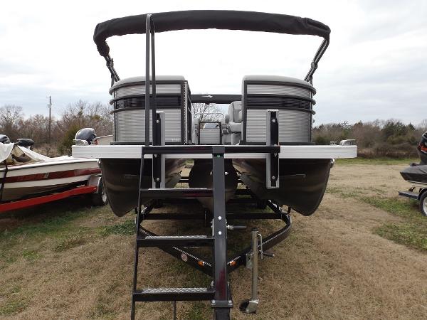 Slide: The Image of 2023 Bennington 22 SXSR pontoon boat on a trailer, rear view. - 1