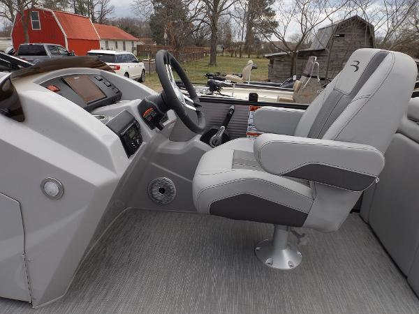 Slide: The Image of 2023 Bennington 22 SXSR boat captain's chair and helm station. - 13