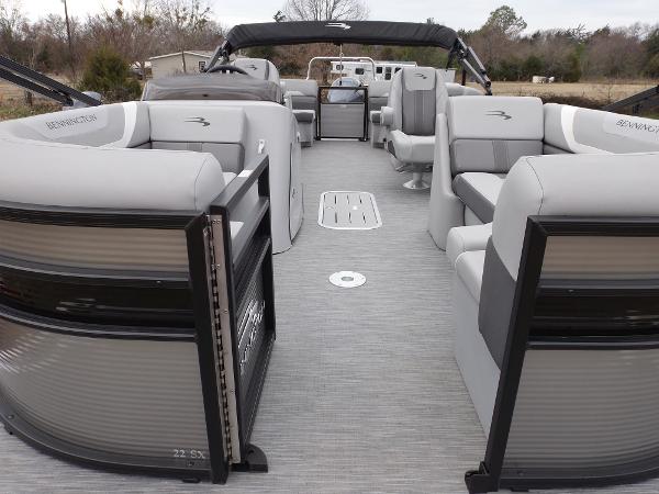 Slide: The Image of 2023 Bennington 22 SXSR pontoon boat interior with gray seating and flooring. - 17