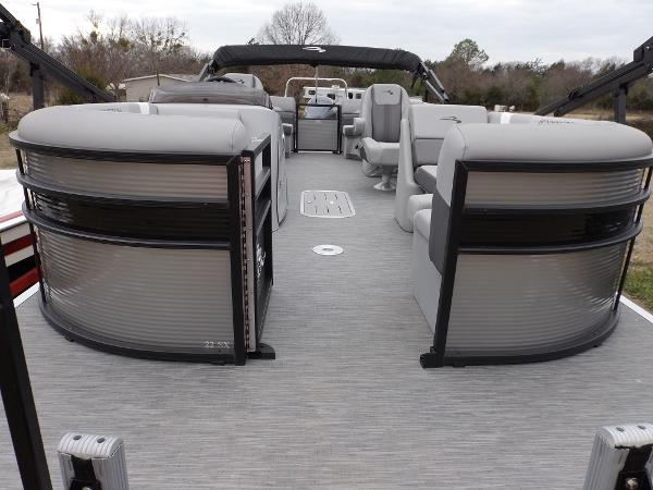 Slide: The Image of 2023 Bennington 22 SXSR pontoon boat with spacious seating and modern design. - 18