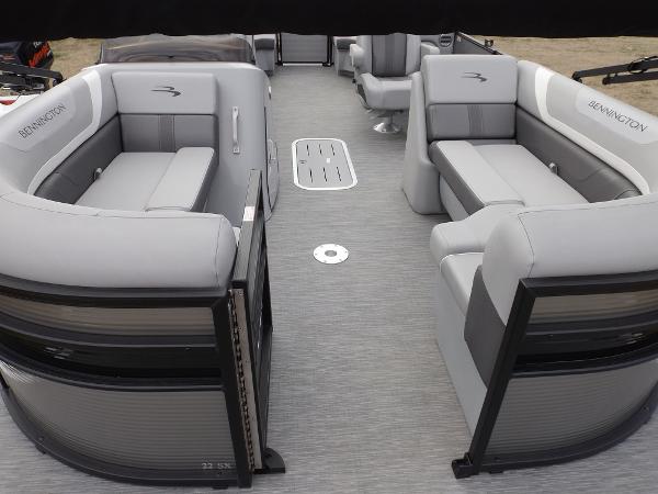 Slide: The Image of 2023 Bennington 22 SXSR pontoon boat with spacious seating and modern design. - 8