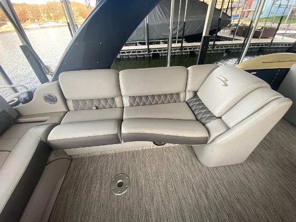 Slide: The Image of Luxurious seating on a 2020 Bennington 30 QSBAX2 boat, featuring elegant gray upholstery. - 28