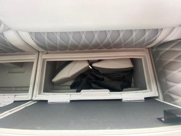 Slide: The Image of Storage compartment in 2020 Bennington 30 QSBAX2 boat with quilted upholstery. - 31