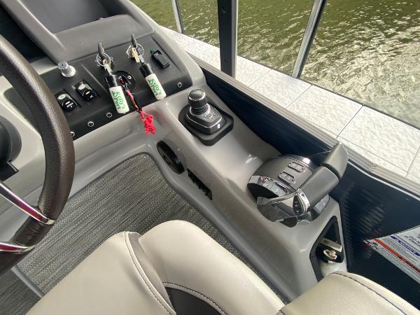 Slide: The Image of Control panel of 2020 Bennington 30 QSBAX2 boat with steering and throttle. - 38