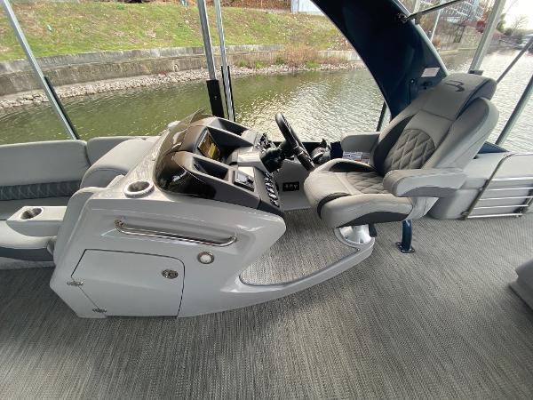 Slide: The Image of 2020 Bennington 30 QSBAX2 boat interior with modern helm and comfortable seating. - 44