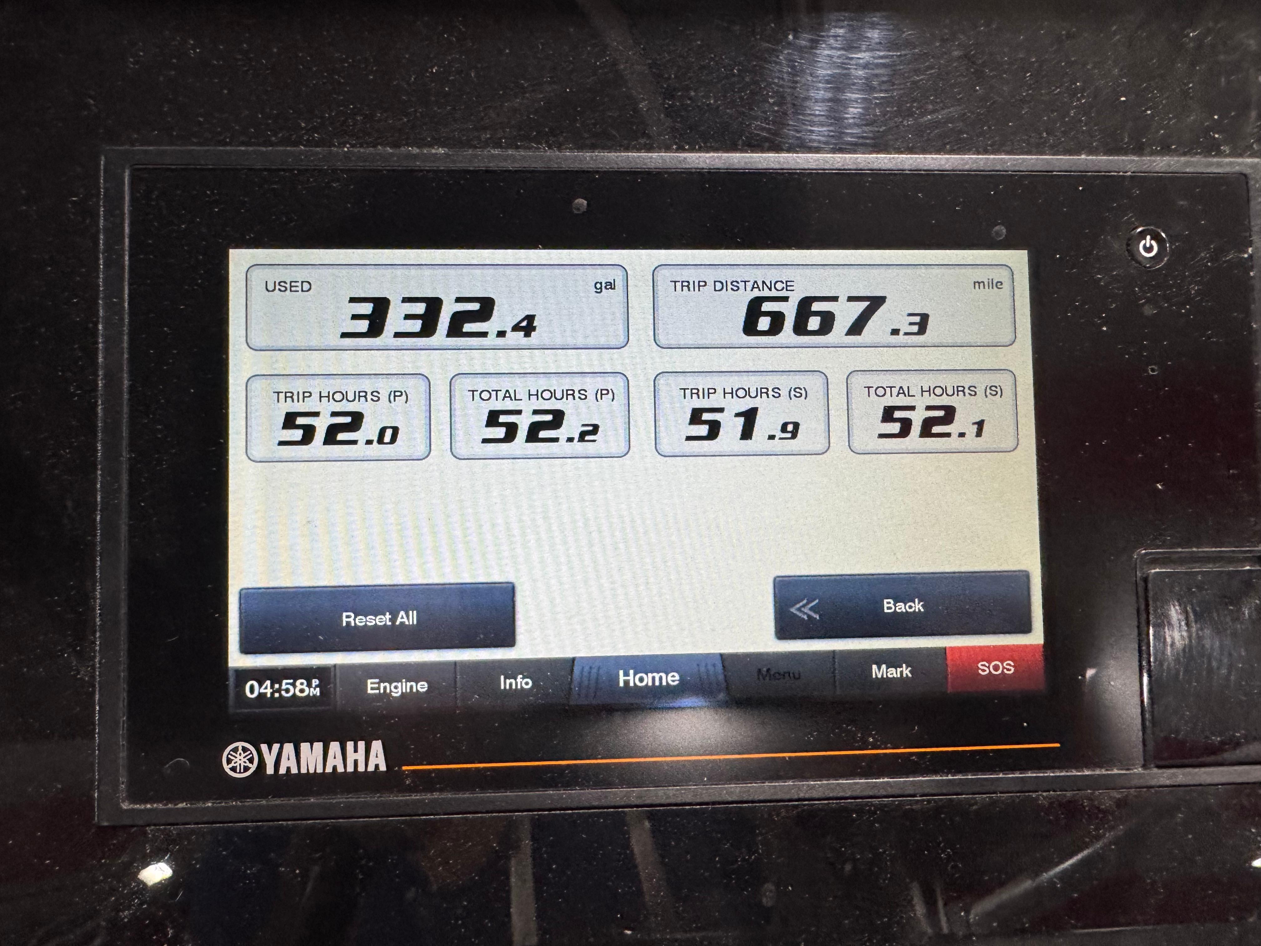 Slide: The Image of Yamaha display showing fuel usage and trip data for 2022 Bennington QX 30. - 13