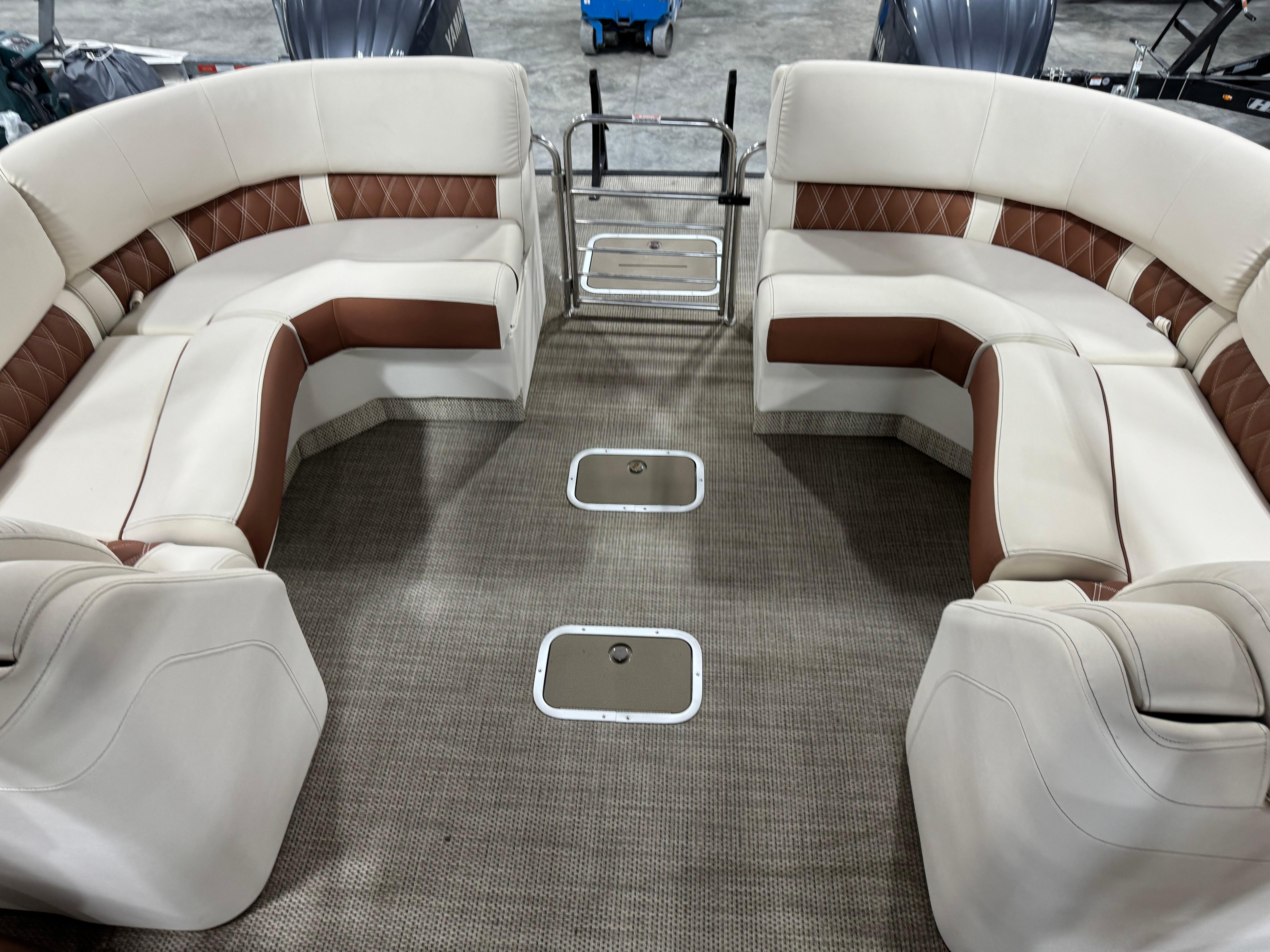 Slide: The Image of Luxurious interior of 2022 Bennington QX 30 pontoon boat with plush seating. - 8