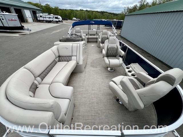 Slide: The Image of 2017 Bennington R23 pontoon boat with spacious seating and modern design. - 19
