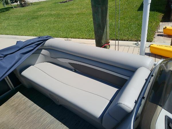 Slide: The Image of 2020 Bennington SV 20 SLV boat seating area with gray upholstery. - 16
