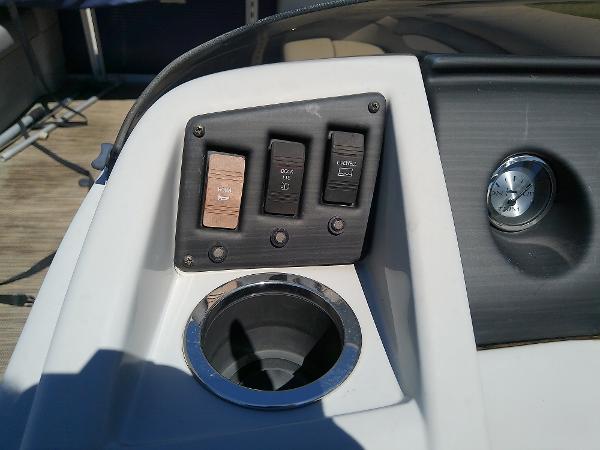 Slide: The Image of Control panel of 2020 Bennington SV 20 SLV boat with cup holder. - 21