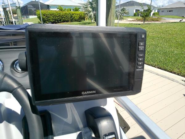 Slide: The Image of Garmin GPS on 2020 Bennington SV 20 SLV boat dashboard, sunny day. - 25