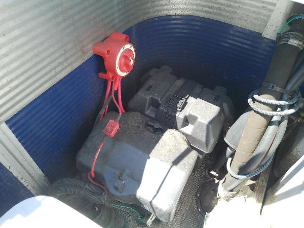 Slide: The Image of 2020 Bennington SV 20 SLV boat battery compartment with wiring and components. - 26