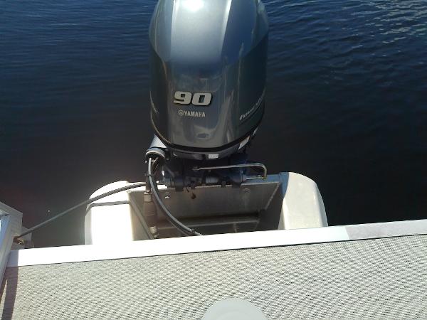 Slide: The Image of 2020 Bennington SV 20 SLV with Yamaha 90 outboard motor on water. - 29