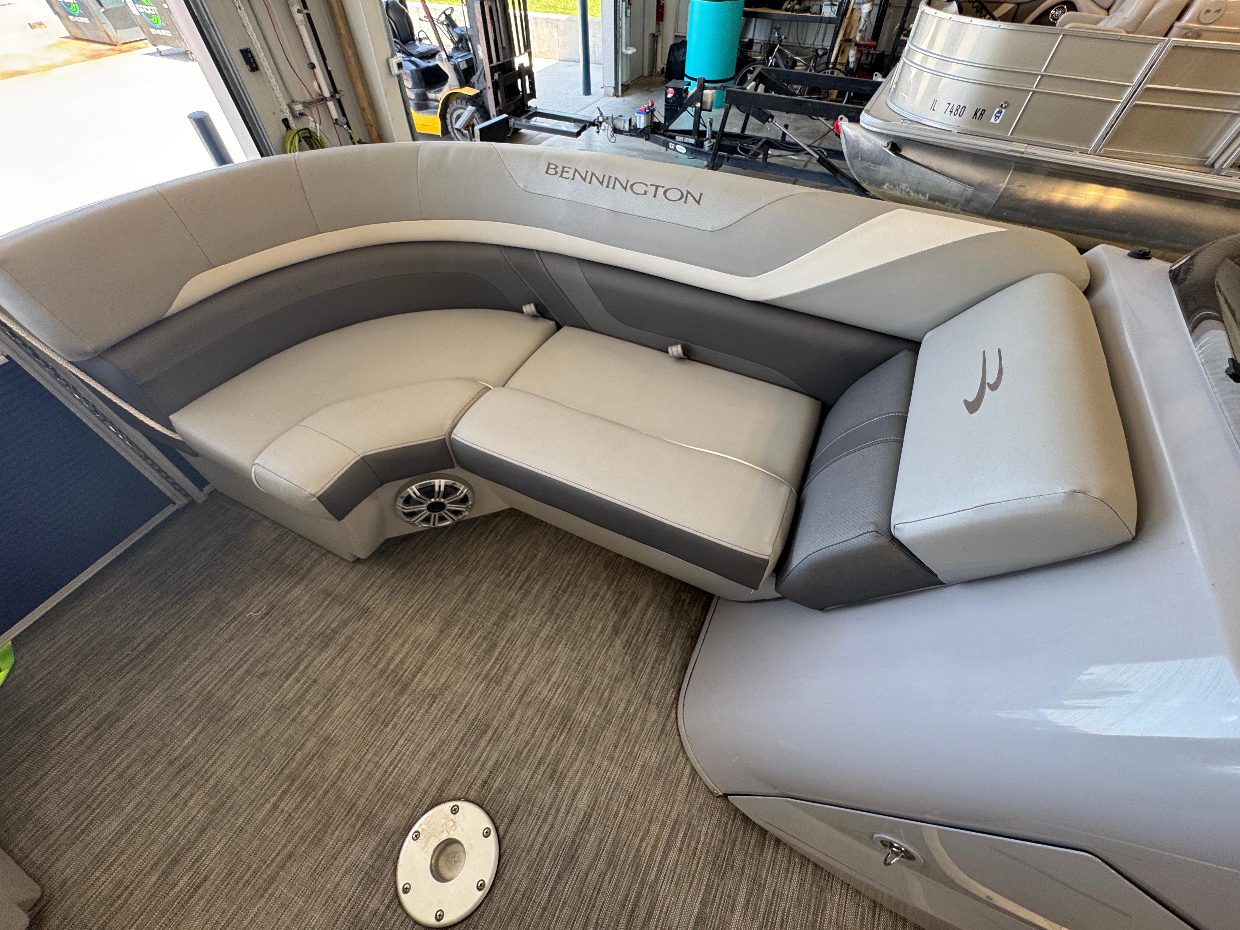 Slide: The Image of 2020 Bennington SX 22 SSRX boat interior with plush seating and modern design. - 10