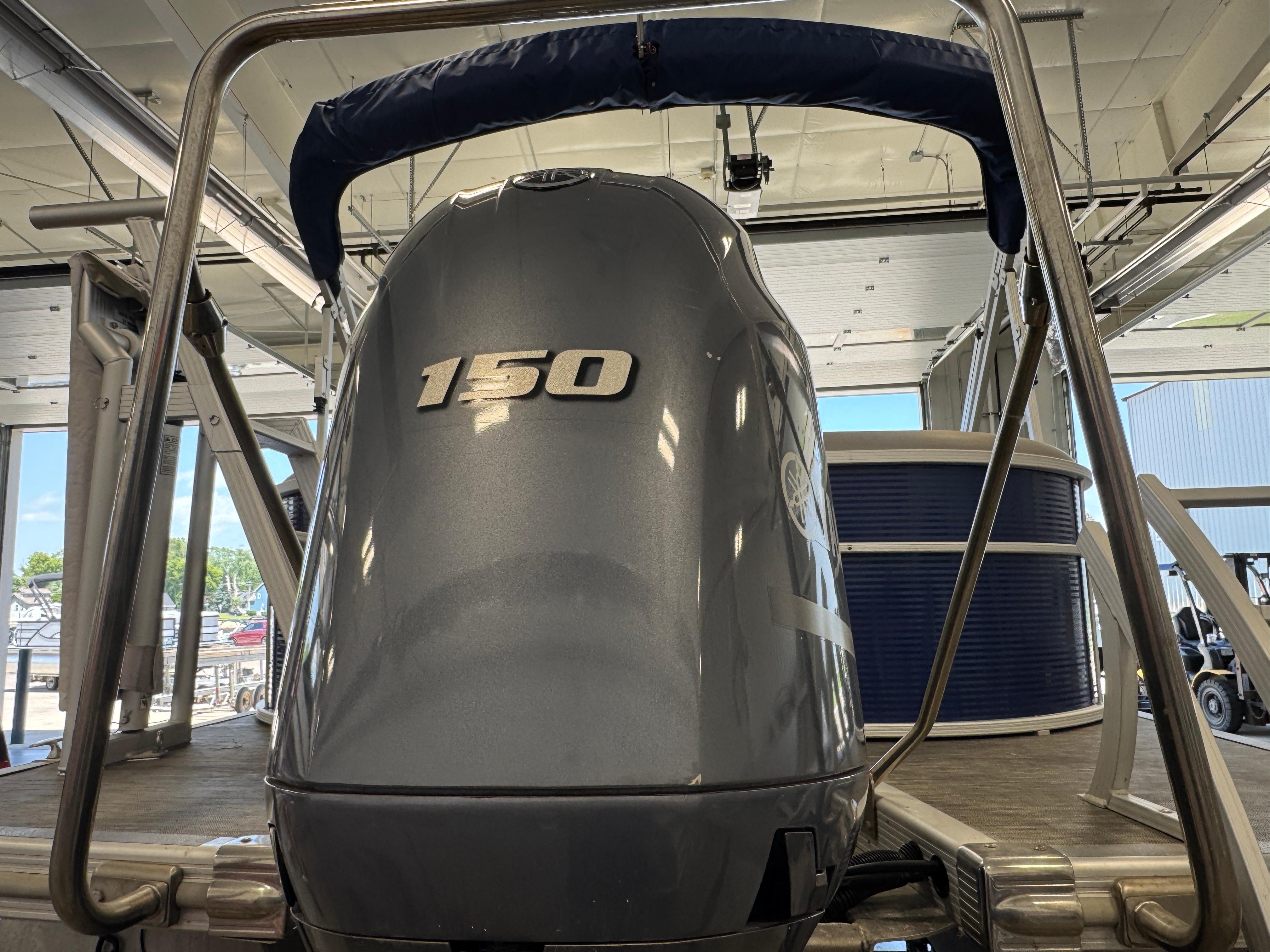 Slide: The Image of 2020 Bennington SX 22 SSRX boat with 150 horsepower engine in showroom. - 3