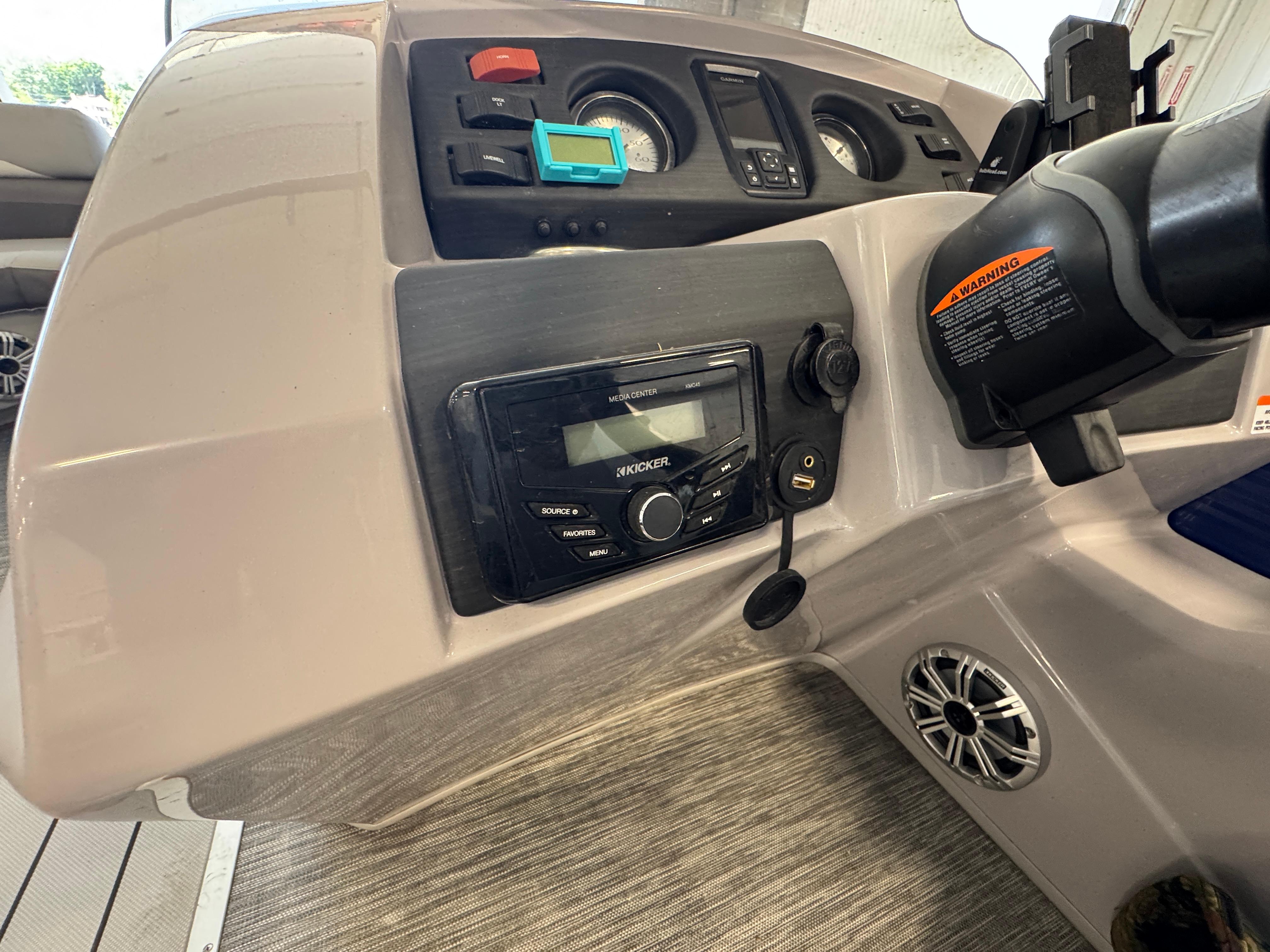 Slide: The Image of Control panel of 2020 Bennington SX 22 SSRX boat with audio system and gauges. - 8