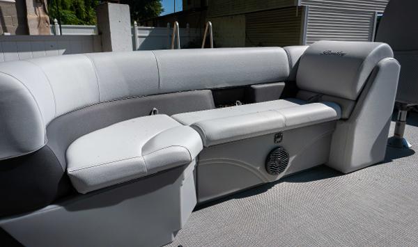 Slide: The Image of 2024 Bentley Pontoons 240 Navigator interior seating area with gray upholstery. - 7