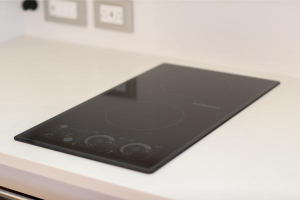 Slide: The Image of Modern induction cooktop on Bertram 35 Flybridge 2023 yacht. - 29