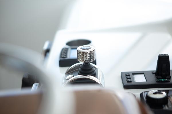 Slide: The Image of Close-up of the control panel on a 2023 Bertram 50 Sport yacht. - 37