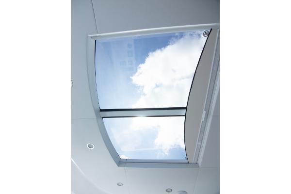 Slide: The Image of Skylight view from the interior of a 2023 Bertram 50 Sport yacht. - 44