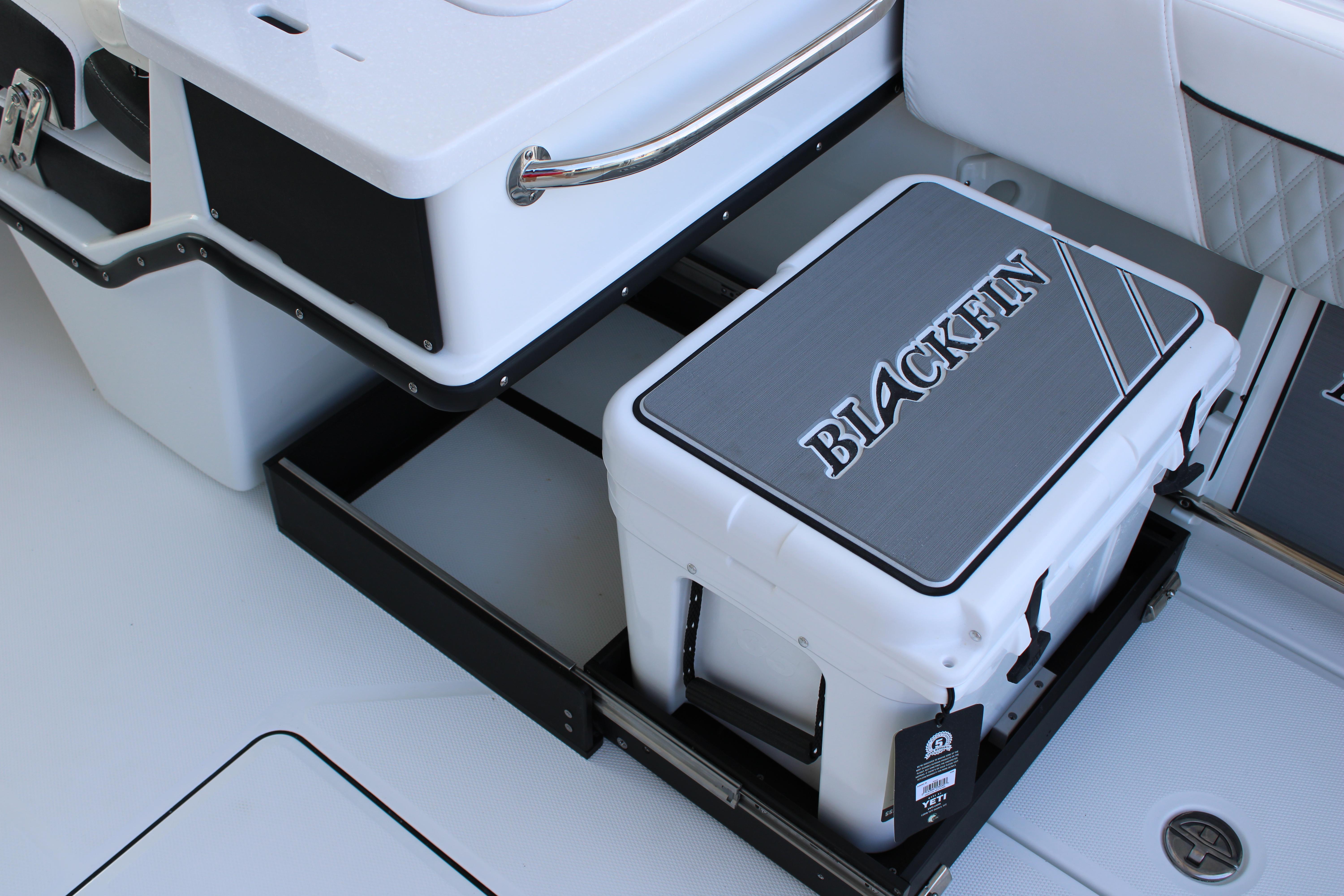 Slide: The Image of 2023 Blackfin 252 DC boat with integrated cooler storage. - 23