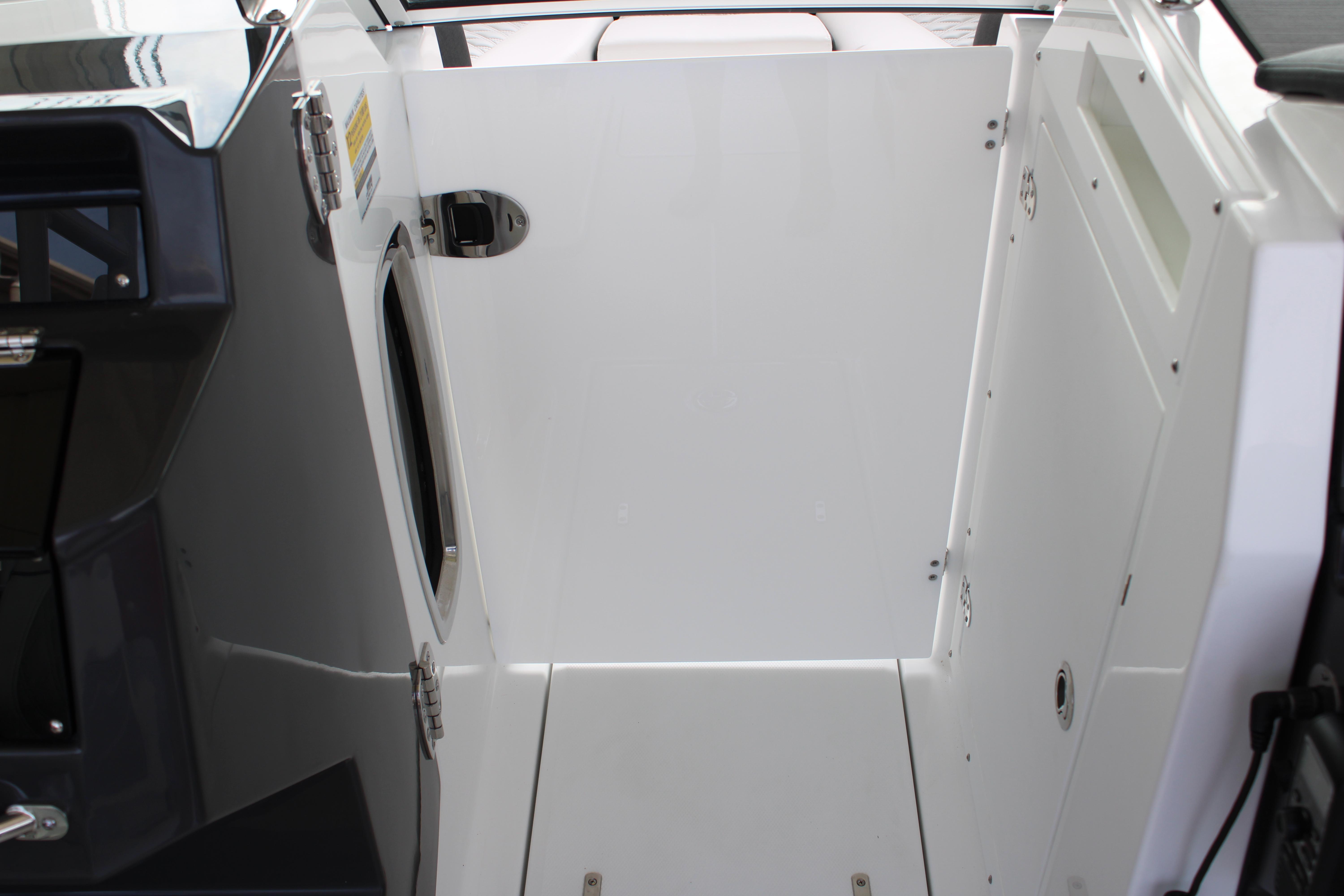 Slide: The Image of Interior view of 2023 Blackfin 252 DC boat's storage compartment. - 34
