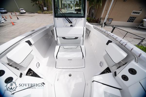 Slide: The Image of 2024 Blackfin 272 CC boat interior with seating and storage, showcased by Sovereign Yachts. - 15