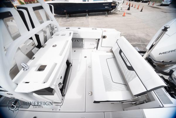Slide: The Image of 2024 Blackfin 272 CC boat interior with seating and storage, showcased at Sovereign Yachts. - 32