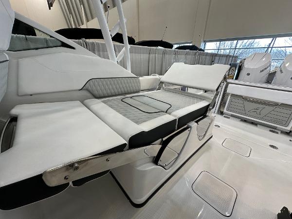 Slide: The Image of 2024 Blackfin 302 DC boat interior with luxurious seating and modern design. - 11