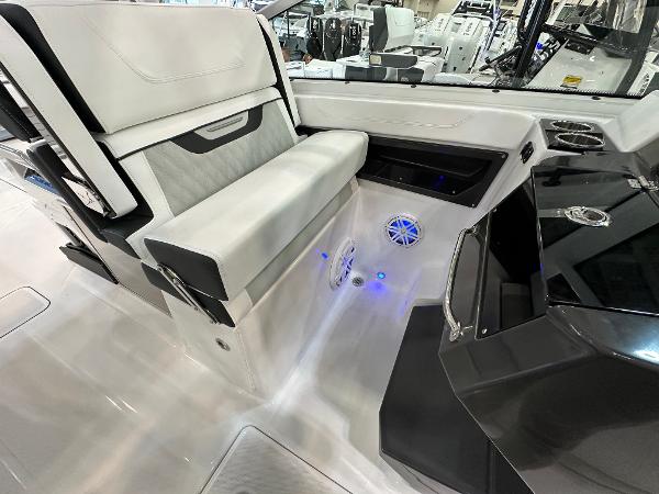 Slide: The Image of 2024 Blackfin 302 DC boat interior with modern seating and LED lighting. - 19