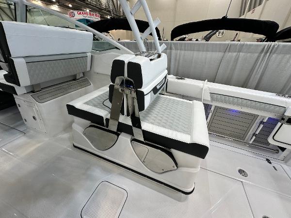 Slide: The Image of 2024 Blackfin 302 DC boat interior with sleek seating and modern design. - 9