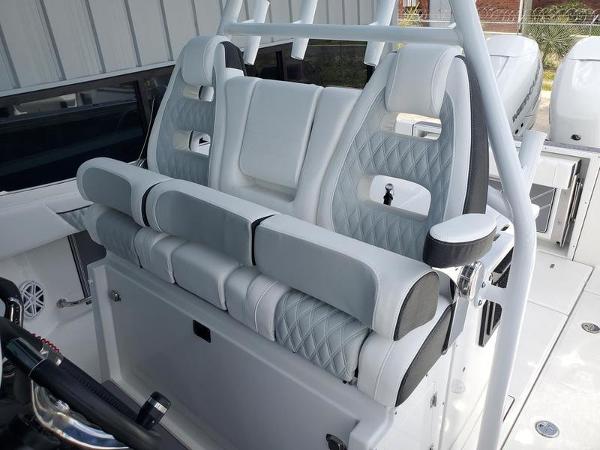 Slide: The Image of 2023 Blackfin 332cc boat with luxurious seating and modern design. - 9