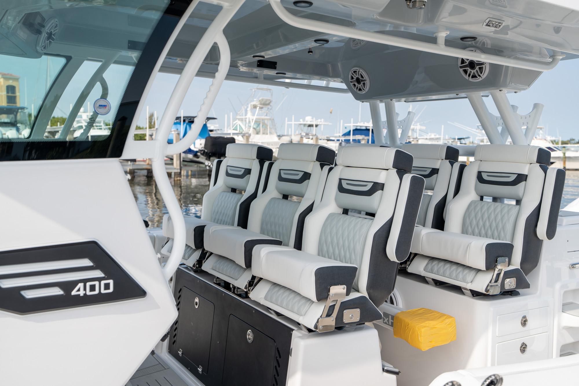 Slide: The Image of 2024 Blackfin 400 CC boat interior with luxurious seating and modern design. - 19