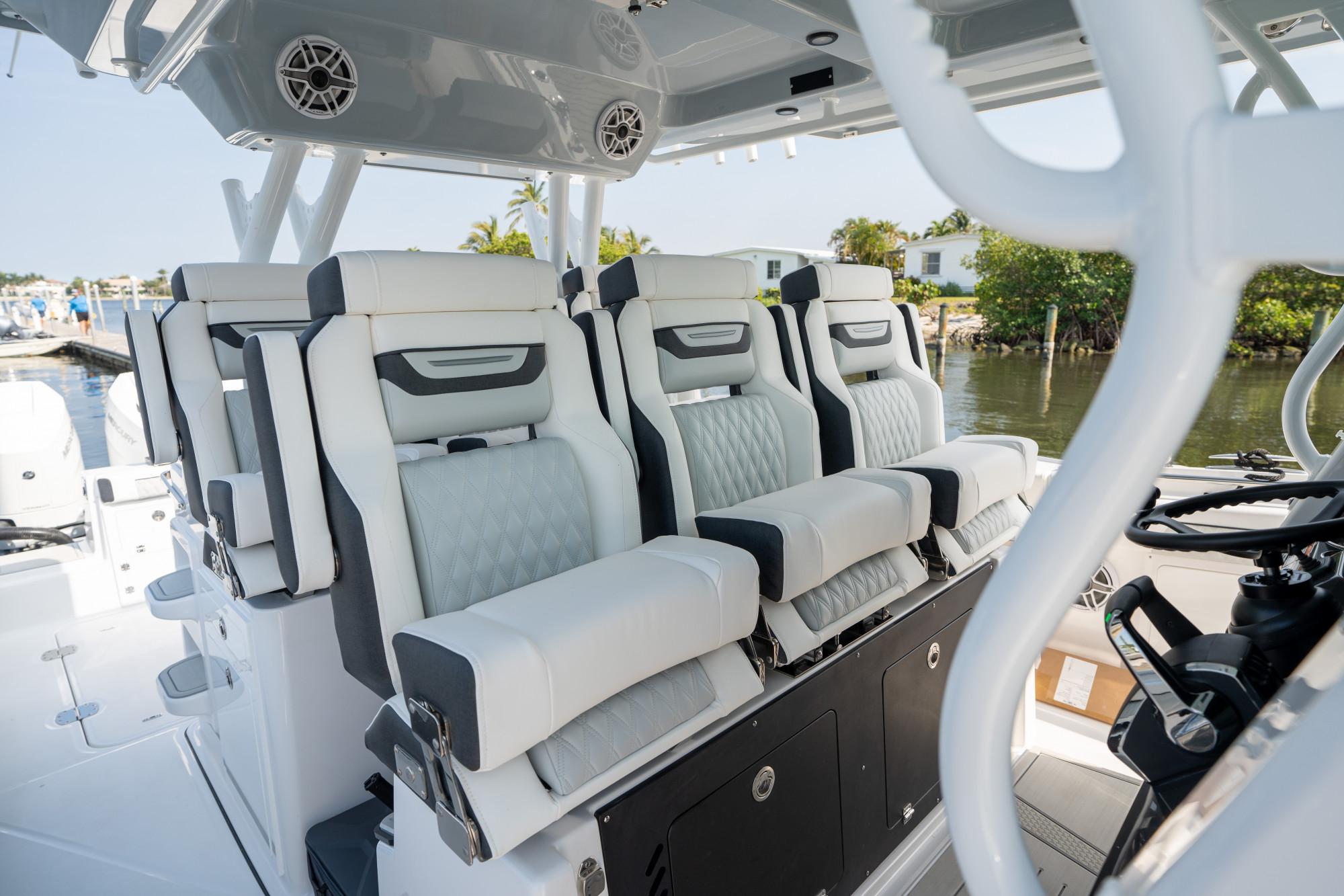 Slide: The Image of 2024 Blackfin 400 CC boat interior with luxurious seating and modern design. - 20