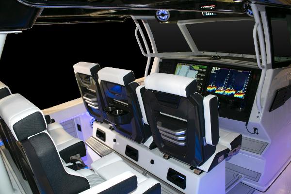 Slide: The Image of Interior of 2025 Blackfin 400 CC boat with advanced navigation system and seating. - 15