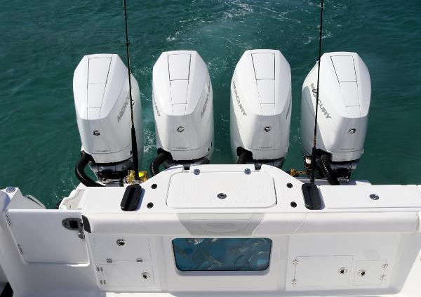 Slide: The Image of 2025 Blackfin 400 CC boat with four powerful Mercury outboard engines. - 9