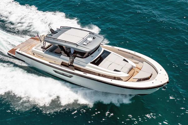 Slide: The Image of 2019 Bluegame BG62 luxury yacht cruising on the ocean. - 0
