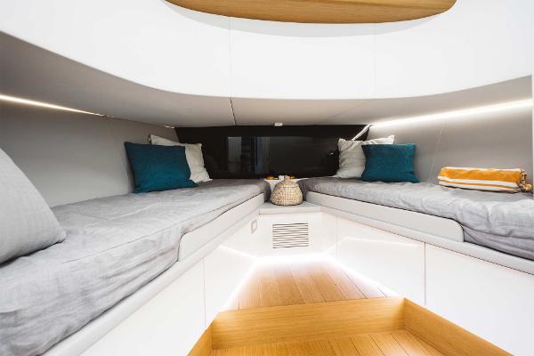 Slide: The Image of Interior cabin of 2019 Bluegame BG62 yacht with twin beds and modern design. - 24