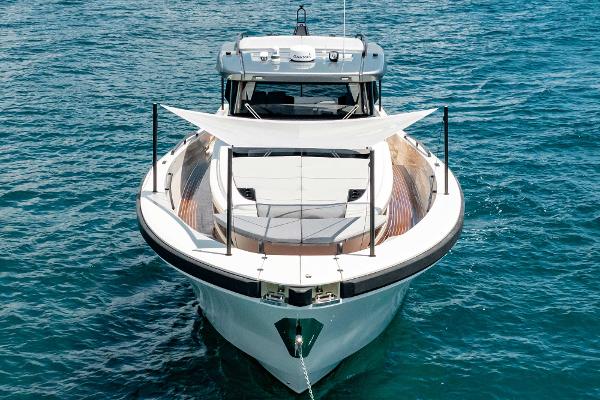 Slide: The Image of 2019 Bluegame BG62 yacht on clear blue water. - 3