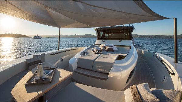 Slide: The Image of Luxury 2019 Bluegame BG62 yacht with sun deck and scenic ocean view. - 9