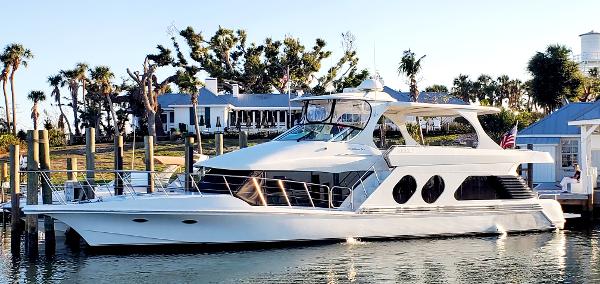 Slide: The Image of Luxury Bluewater 5800 yacht docked at marina, 2000 model. - 0