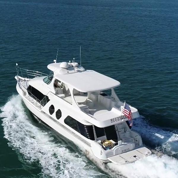 Slide: The Image of Bluewater 5800 yacht cruising on open water, 2000 model. - 15