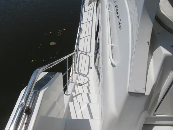 Slide: The Image of Staircase on a 2000 Bluewater 5800 yacht, leading to the lower deck. - 20
