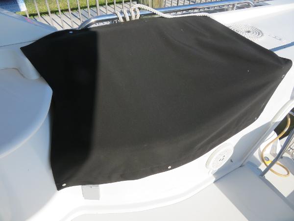 Slide: The Image of Black cover on Bluewater 5800 boat, 2000 model, protecting equipment. - 35