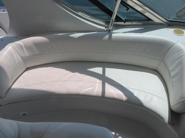 Slide: The Image of White leather seating on a 2000 Bluewater 5800 yacht. - 42
